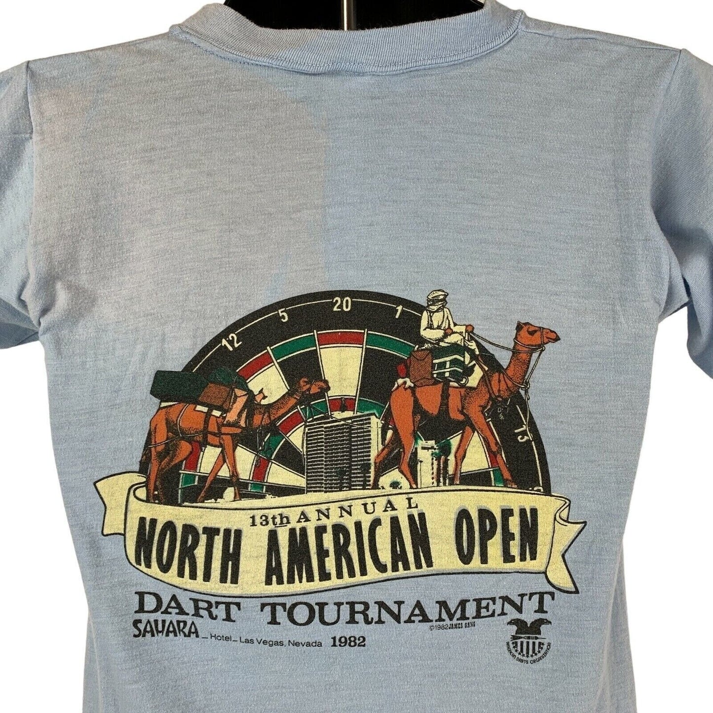 Light blue T-shirt featuring 13th Annual North American Open Dart Tournament Las Vegas graphic on back