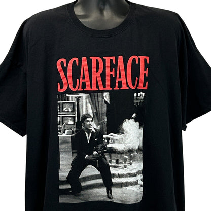 Front view of black boohooMAN Scarface t-shirt featuring a graphic print of a scene from the movie