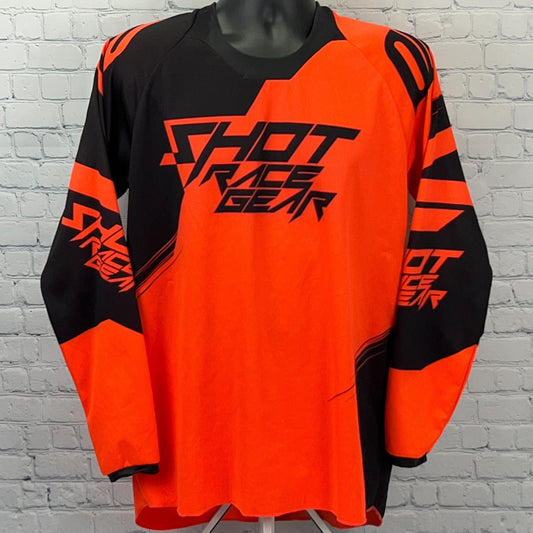 Shot Race Gear Motocross Jersey in vibrant orange and black with bold logo design on front