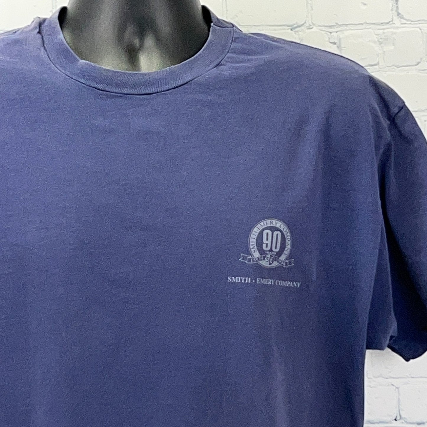 Front view of the navy Smith Emery T Shirt by Hanes with logo on the chest and comfortable fit