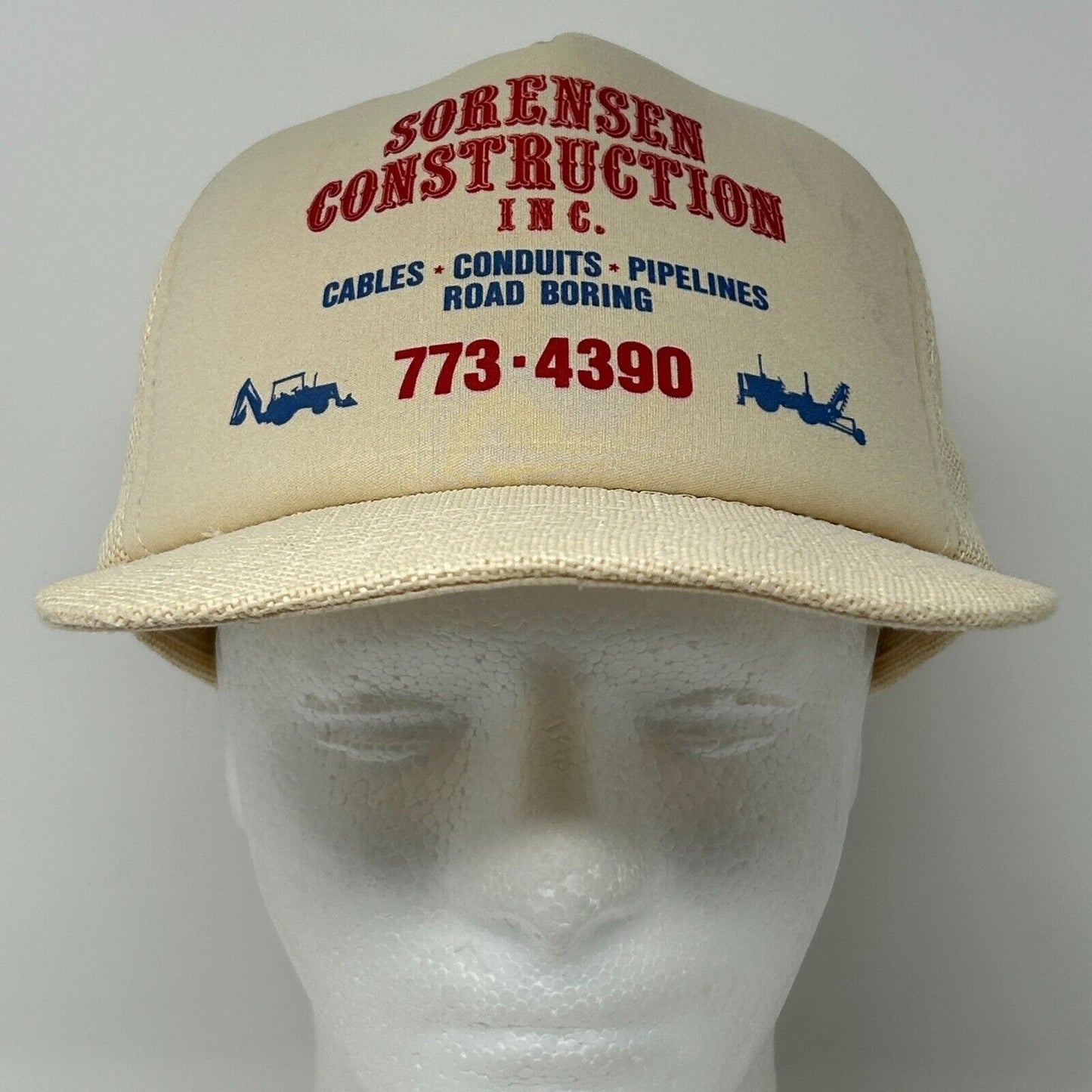 Cream-colored hat with red 'Sorensen Construction' logo and contact details on the front view