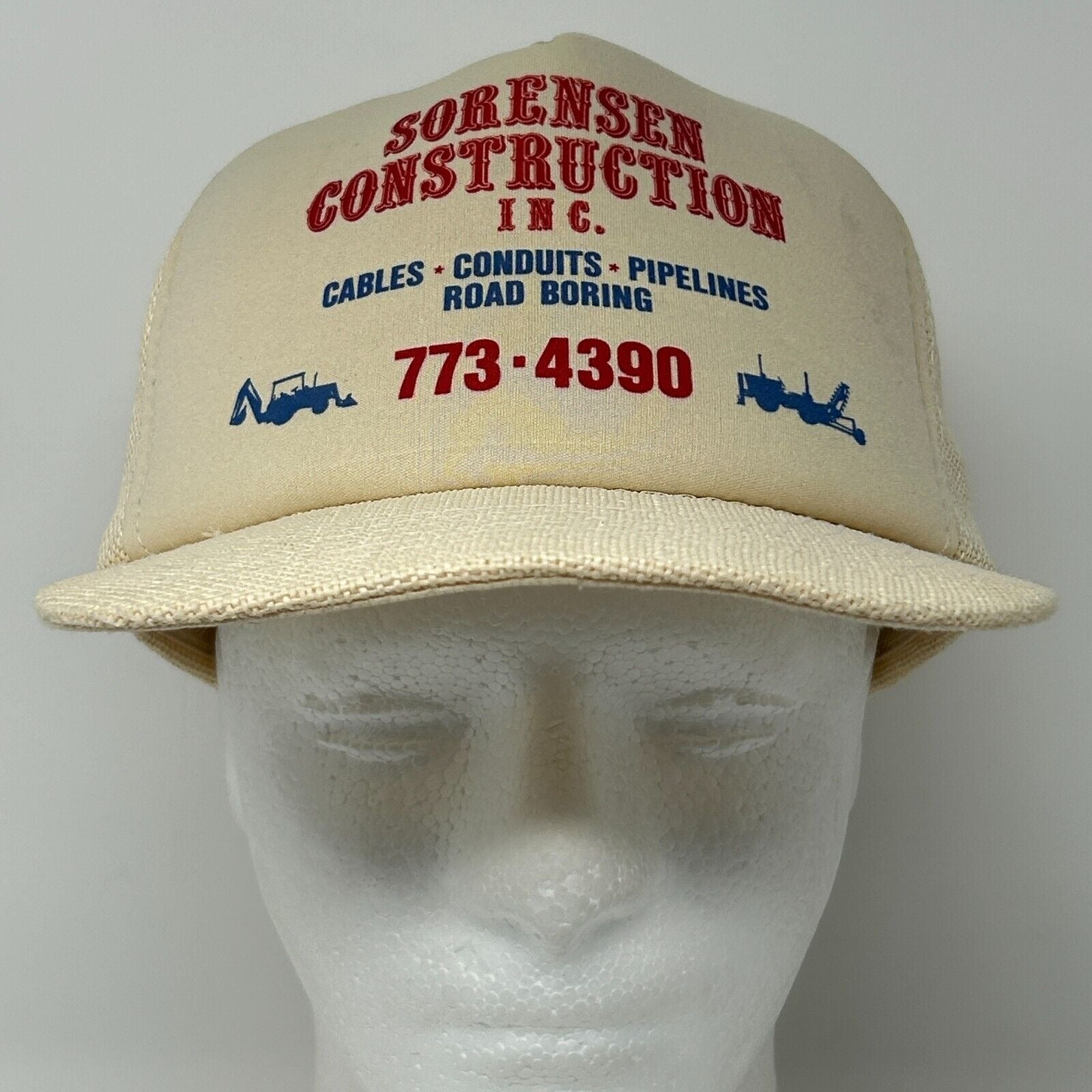 Cream-colored hat with red 'Sorensen Construction' logo and contact details on the front view