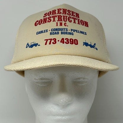 Cream-colored hat with red 'Sorensen Construction' logo and contact details on the front view