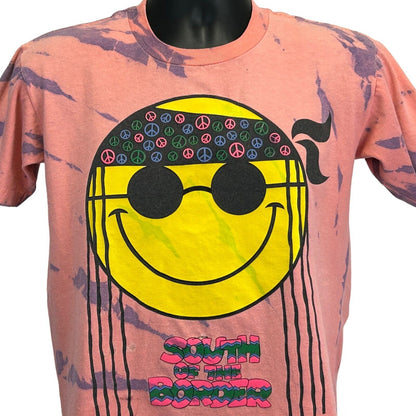 South of the Border orange tie-dye T-shirt featuring a smiley face and peace sign design, front view