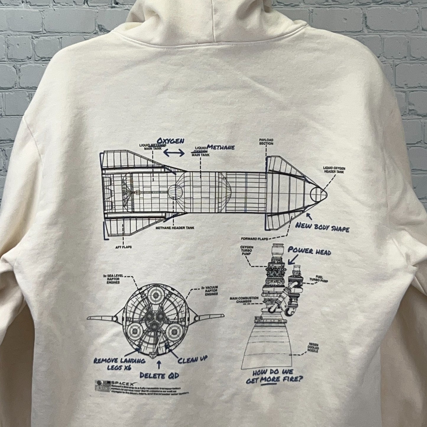 SpaceX Hoodie in cream with detailed rocket blueprint graphic on the back