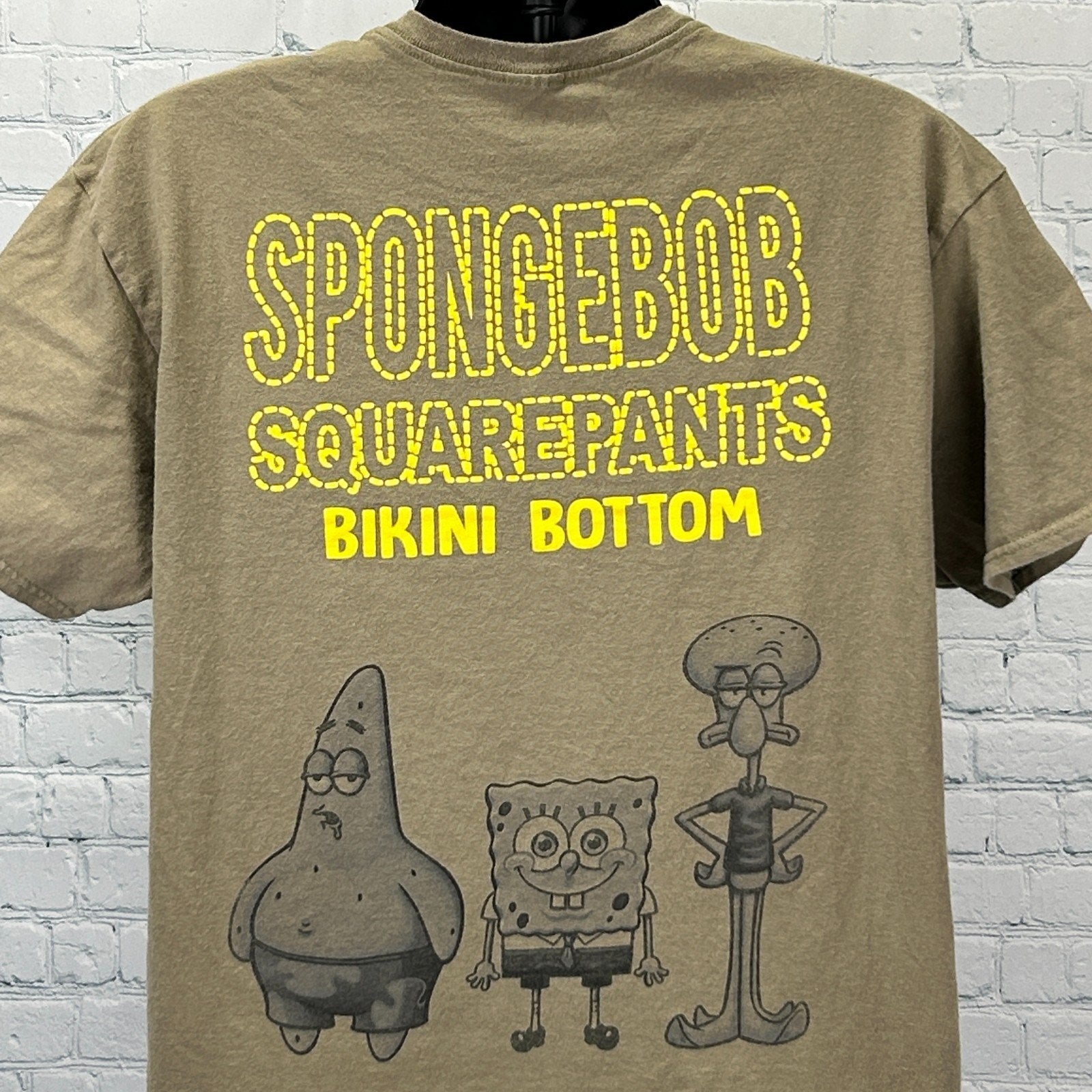 Gray Spongebob Squarepants T Shirt featuring SpongeBob, Patrick, and Squidward from Bikini Bottom in front view