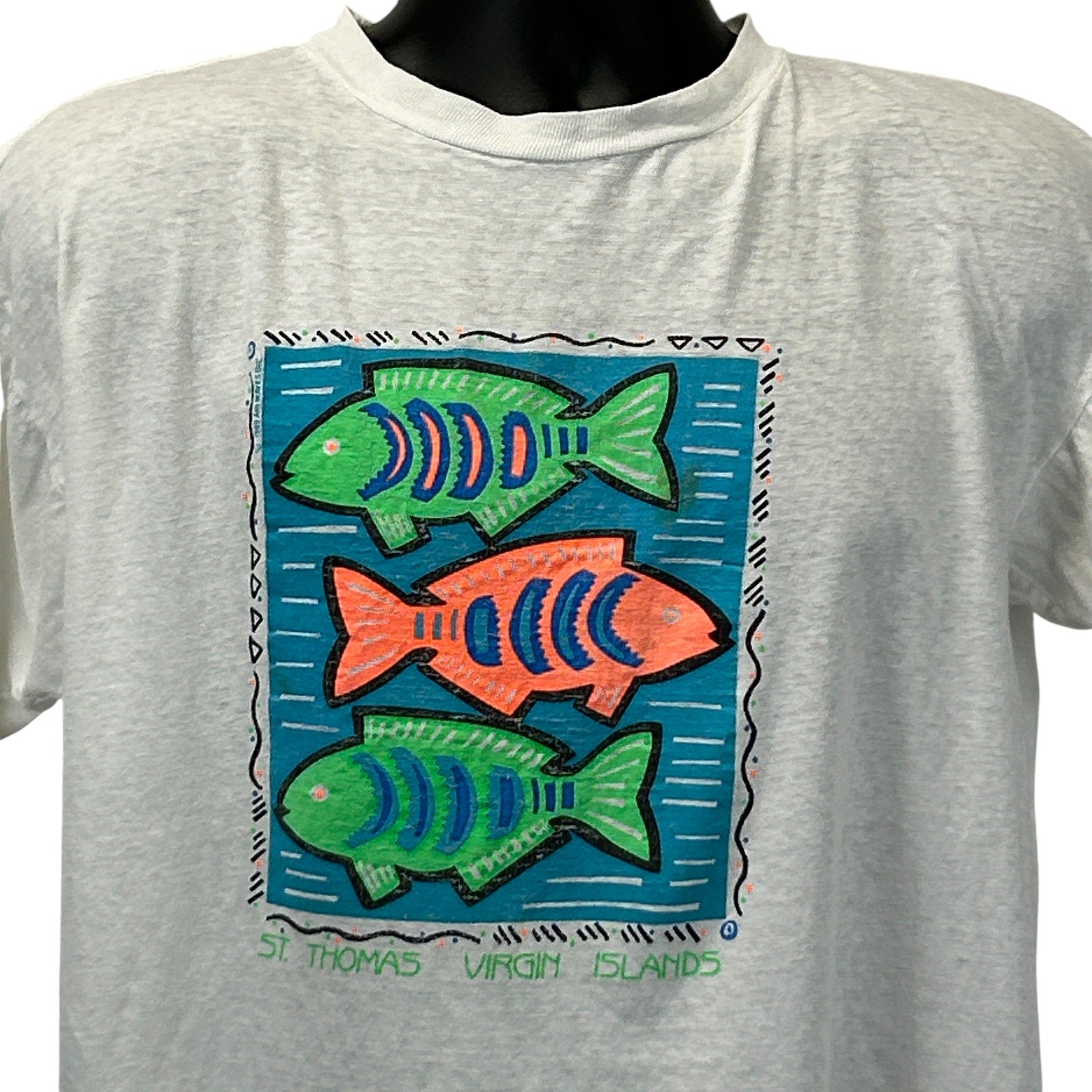 Front view of a Vintage St Thomas T-Shirt featuring colorful fish graphic design