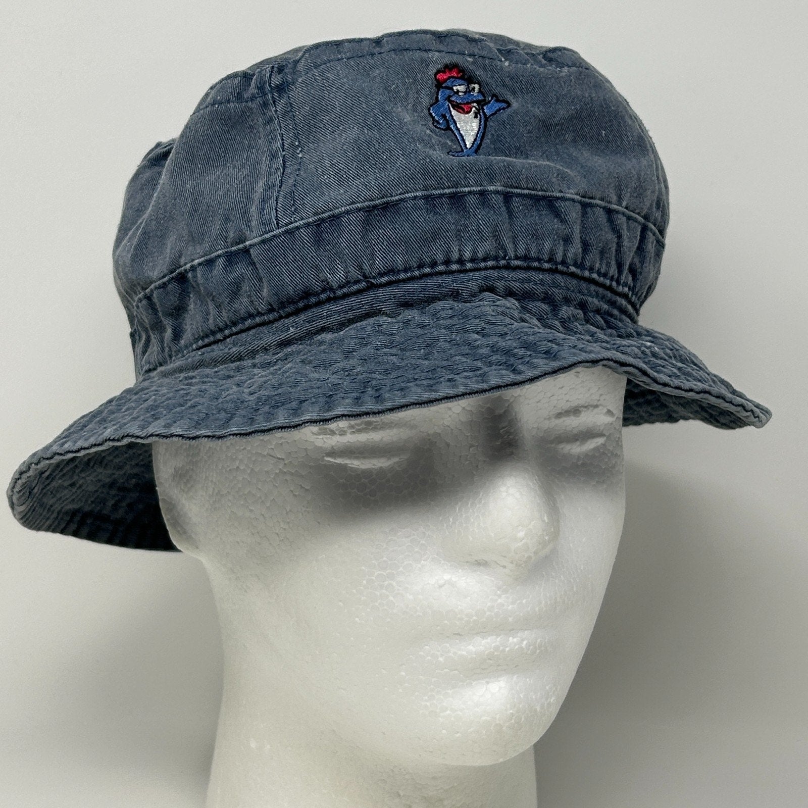 Vintage StarKist Hat in dark gray with an embroidered logo, front view on a mannequin head