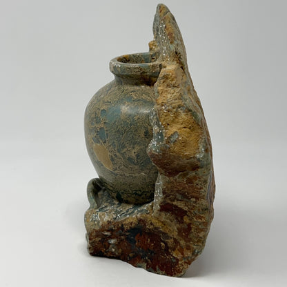 Unbranded vintage stone vase with natural texture, earthy tones, and unique shape