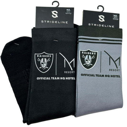 Strideline Las Vegas Raiders Socks in black and gray, front view with team logos and stripes on the top