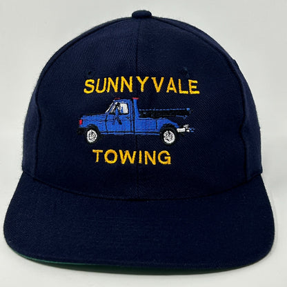 Navy Vintage Baseball Cap Hat featuring SUNNYVALE TOWING logo with blue truck embroidery on the front