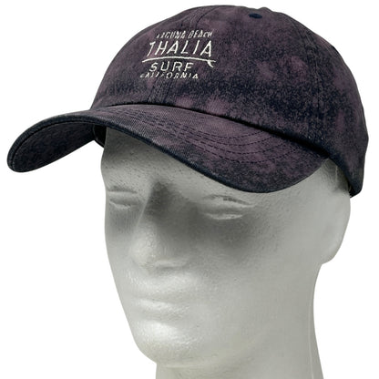 Front view of a dark navy Thalia Surf Shop baseball cap with white logo and adjustable strap