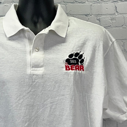 Jerzees white polo shirt featuring The Bear logo on the front, size medium, with a classic collar