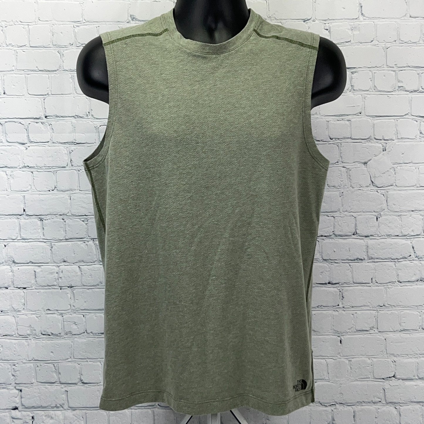 The North Face Green Sleeveless Men's Shirt, Front View with Logo on Hem