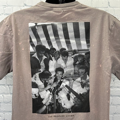 Muhammad Ali T Shirt in taupe color featuring a large black and white photo on the back