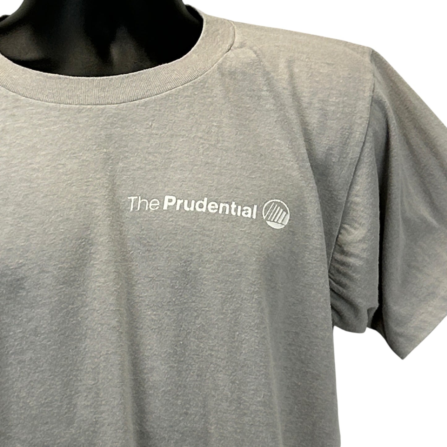 Gray Vintage T-Shirt featuring The Prudential Financial Services logo on the front