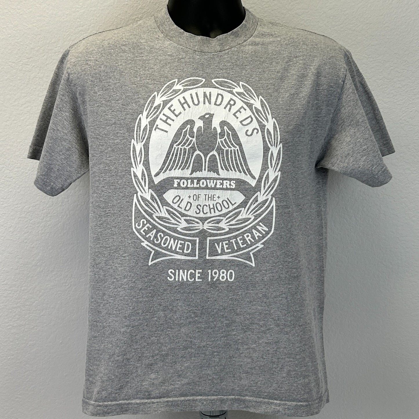 The Hundreds gray streetwear graphic t shirt front view featuring veteran design since 1980