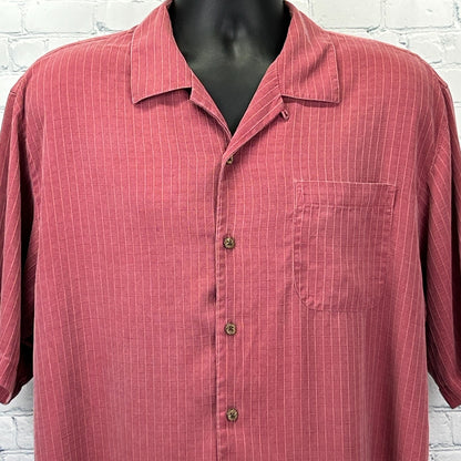Tommy Bahama Hawaiian Shirt in coral with vertical stripes, featuring a chest pocket and front button closure