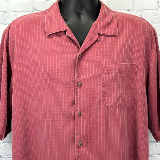 Tommy Bahama Hawaiian Shirt in coral with vertical stripes, featuring a chest pocket and front button closure