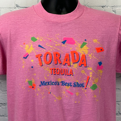 Front view of pink Torada Tequila T-Shirt with colorful graphic and text, size medium, Screen Stars brand