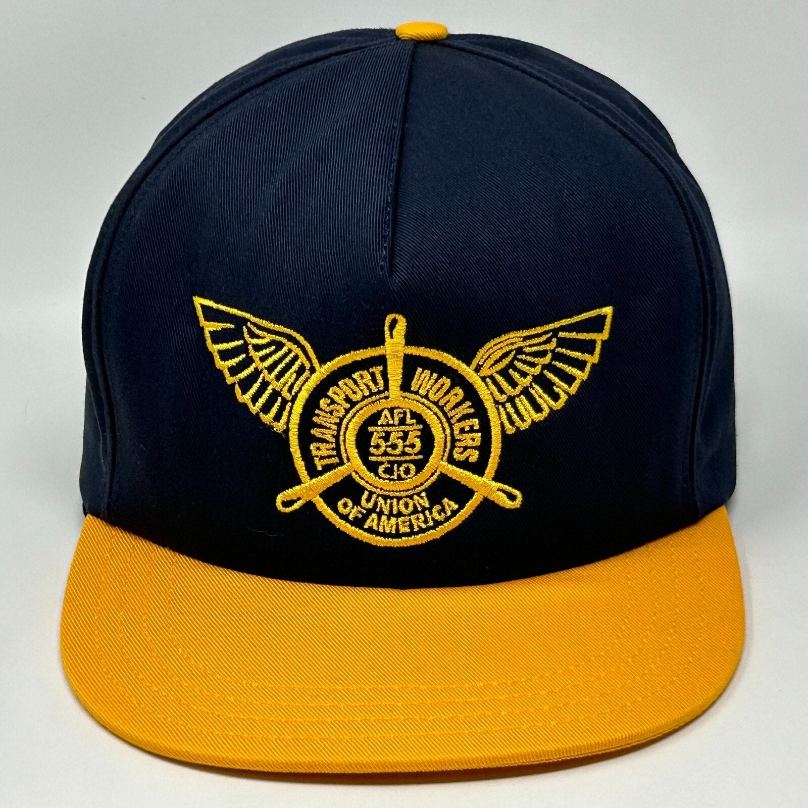 Front view of Unionwear Transport Workers Labor Union Hat in navy and yellow with winged logo