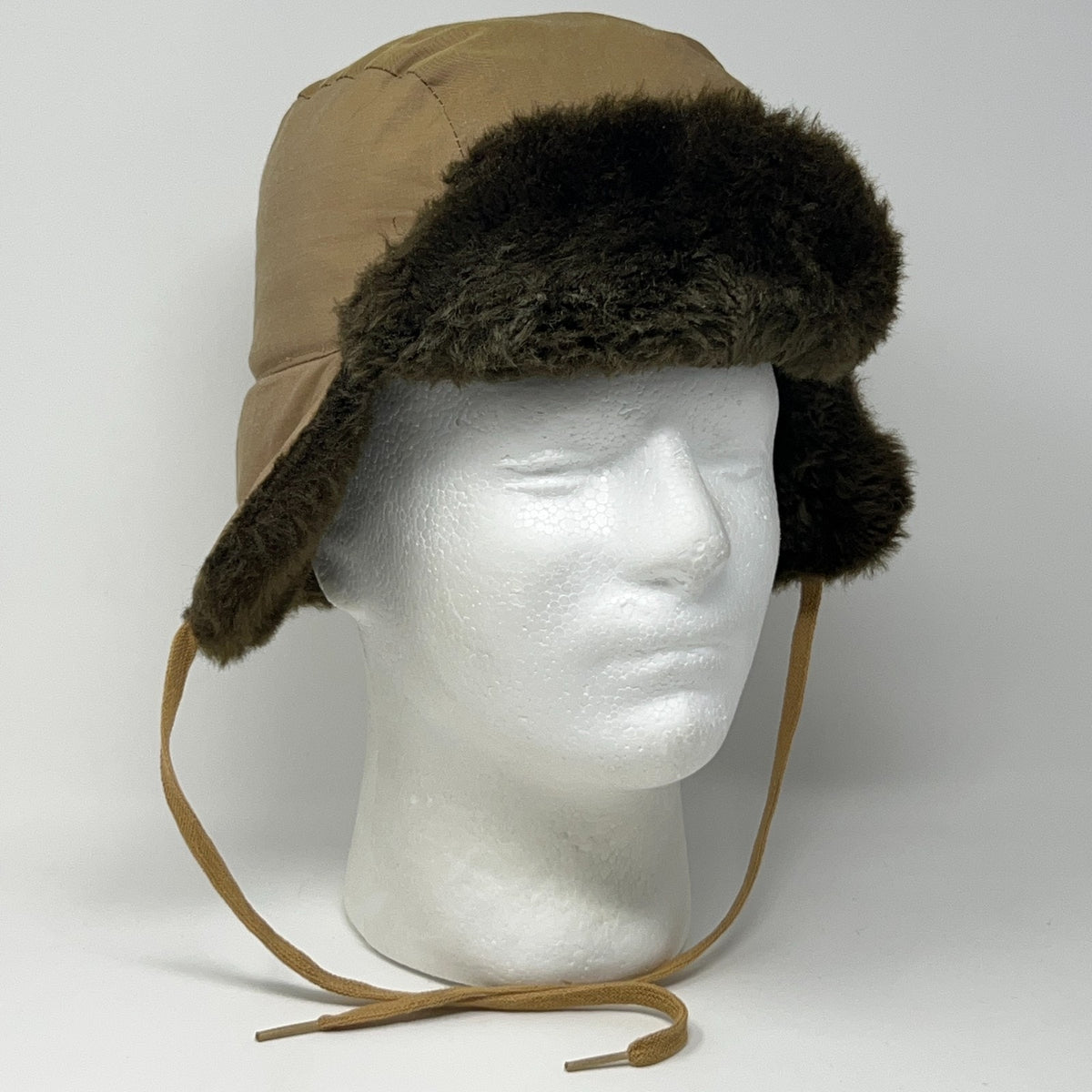 Norm Thompson Trapper Hat in brown with faux fur lining and adjustable chin straps