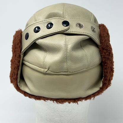 Vintage 1980s beige trapper hat with brown faux fur ear flaps and black buttons, rear view
