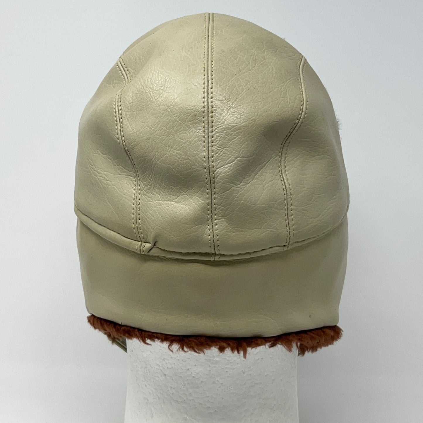 Vintage 1980s beige trapper hat in medium size, shown from the back with faux fur trim