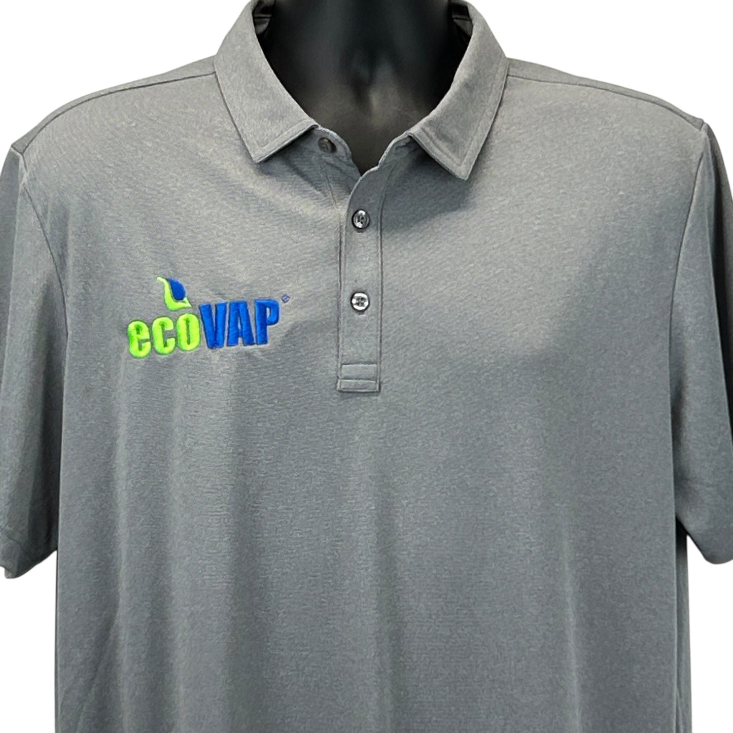 Travis Mathew ecoVAP gray polo shirt with logo, front view, size medium.