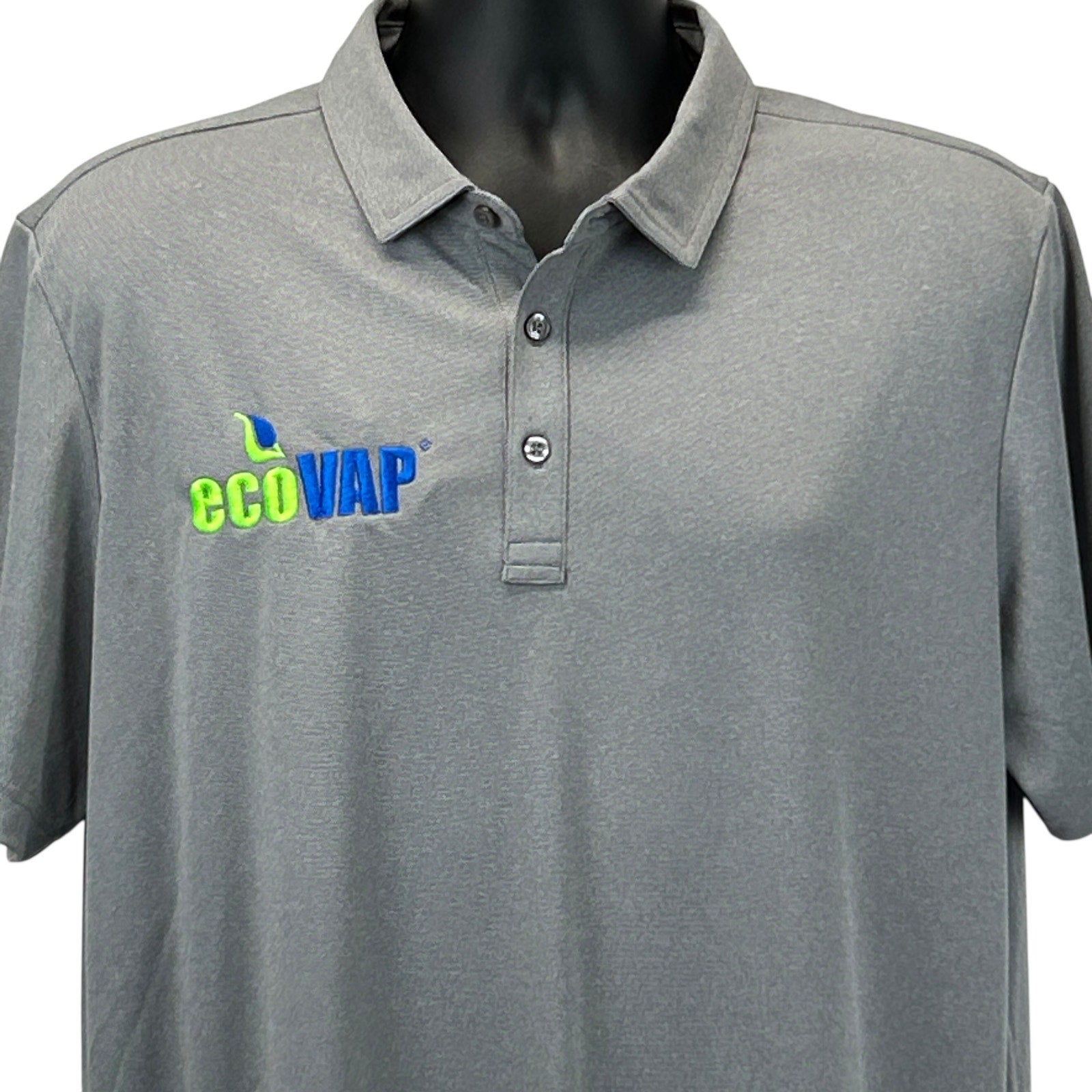 Travis Mathew ecoVAP gray polo shirt with logo, front view, size medium.