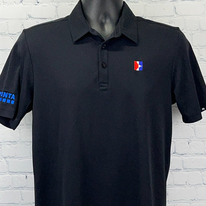 Travis Mathew Polo in black with logo detail on the front and left sleeve for a stylish look