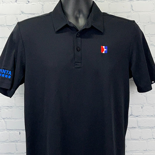 Travis Mathew Polo in black with logo detail on the front and left sleeve for a stylish look