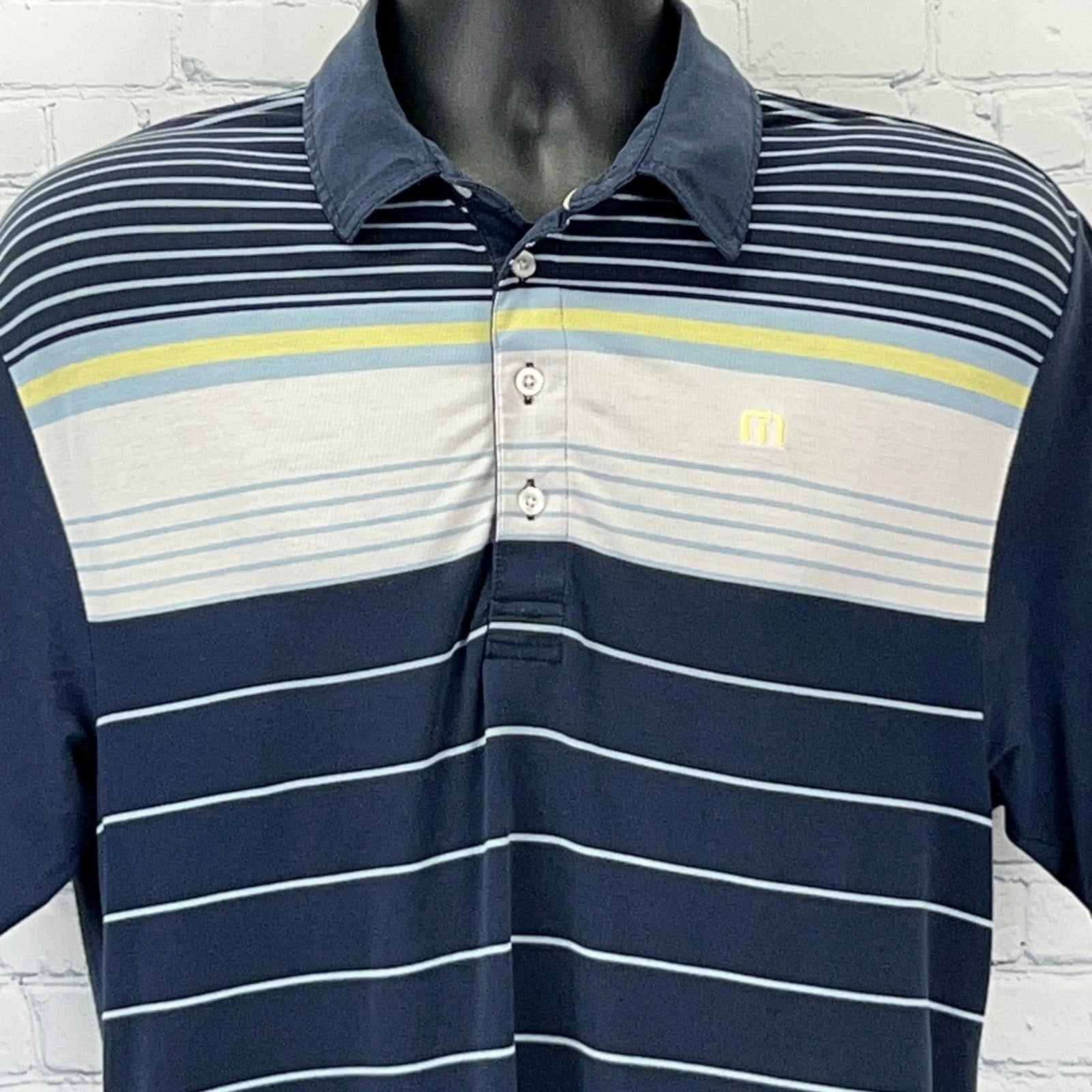 Travis Mathew Navy Striped Polo Shirt with Yellow and Gray Detailing, Front View, Size Large