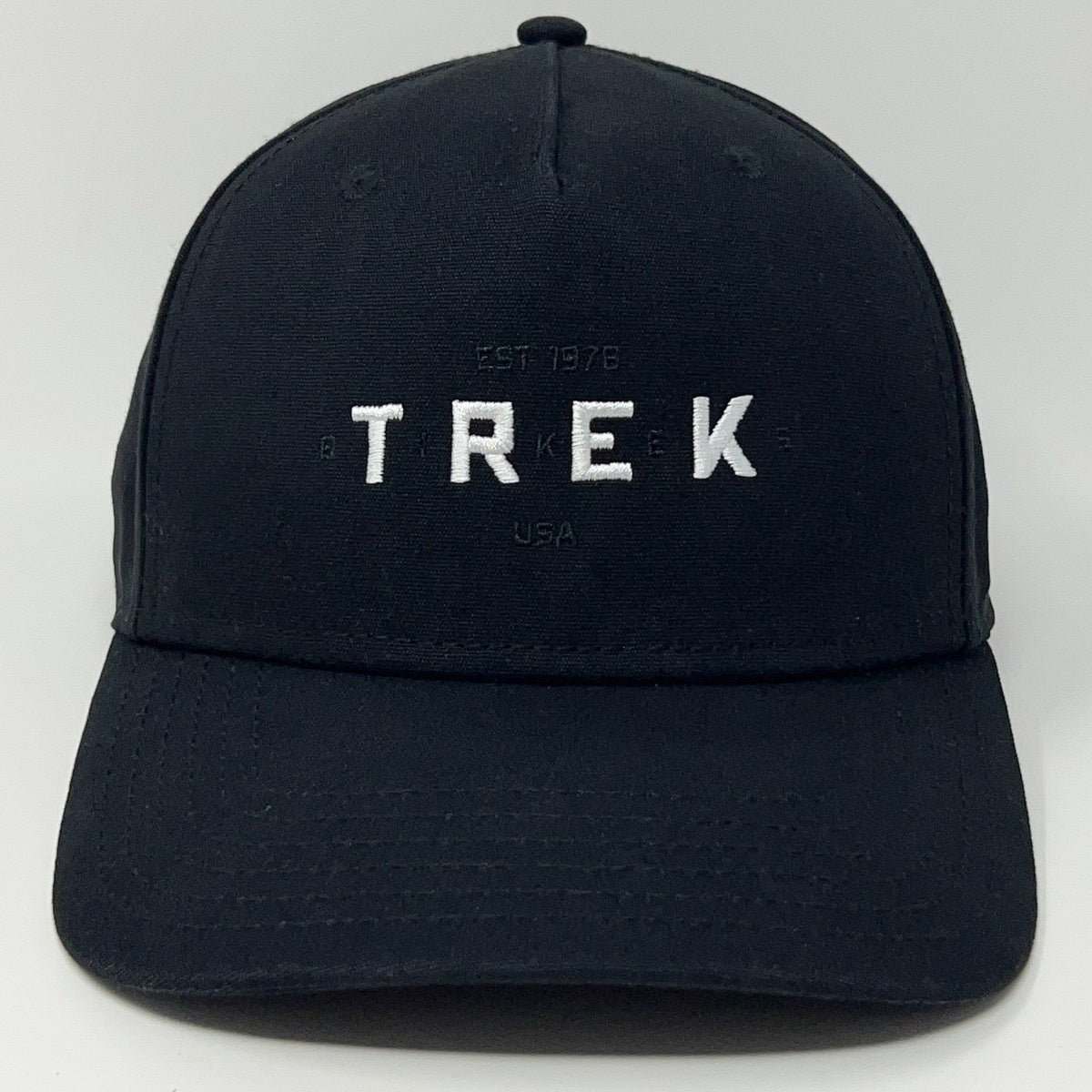 Sportiqe black Trek cap with embroidered logo, vintage style for cycling enthusiasts