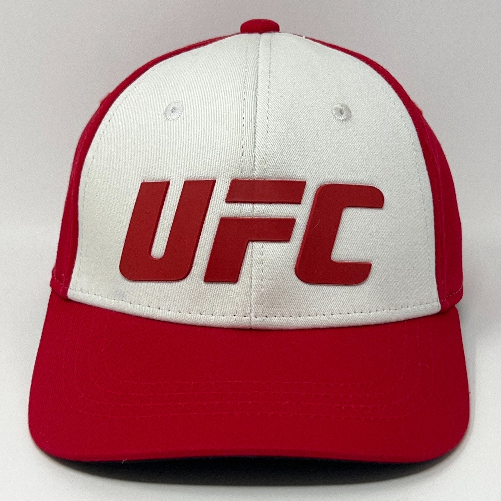 UFC cap in red and white with large red UFC logo on front