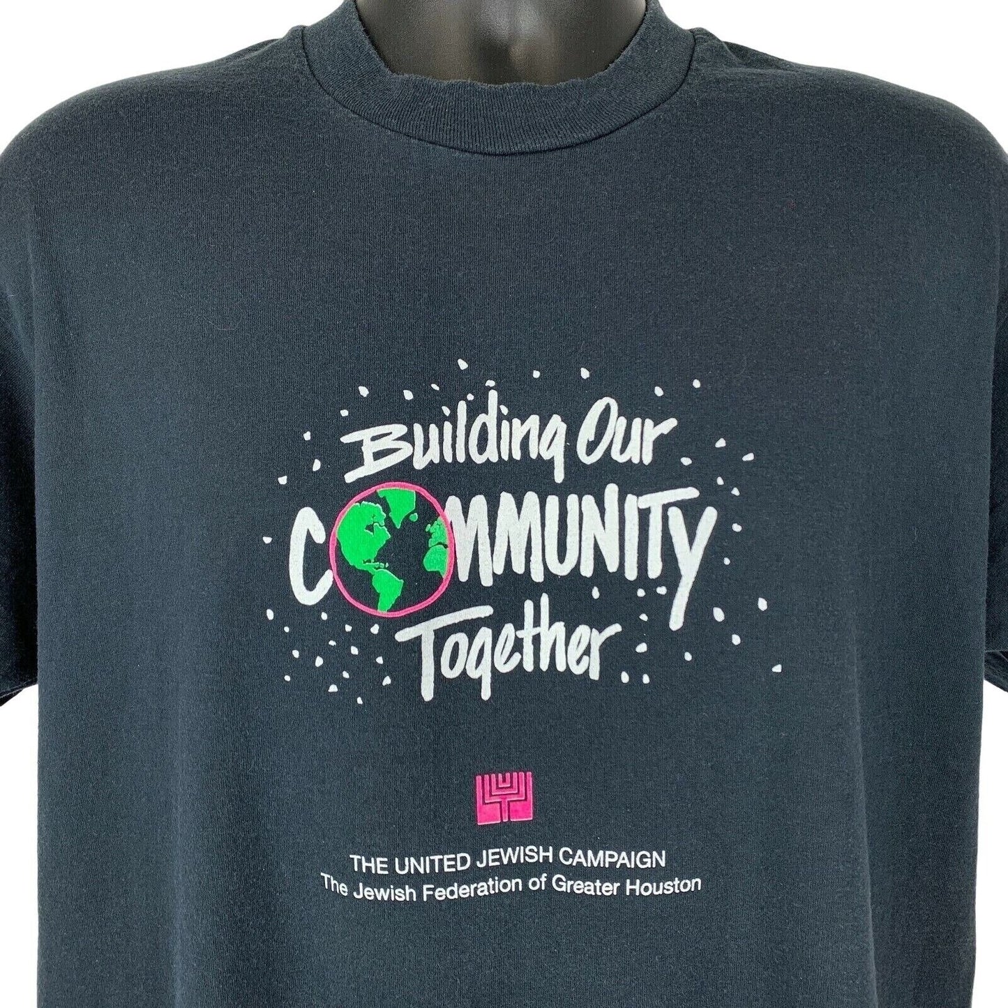 Front view of Screen Stars T-Shirt in black featuring 'Building Our Community Together' and Jewish Campaign logo