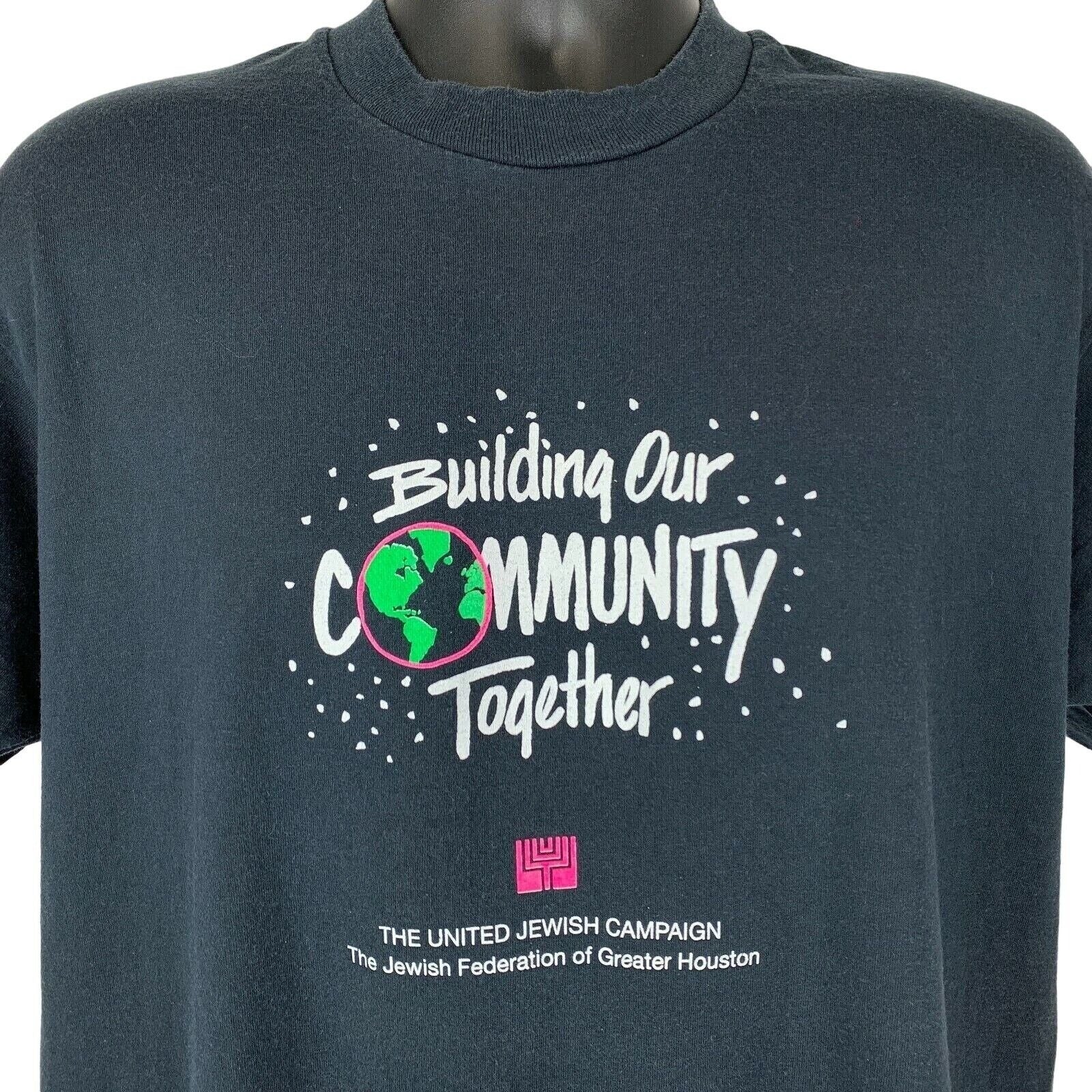 Front view of Screen Stars T-Shirt in black featuring 'Building Our Community Together' and Jewish Campaign logo