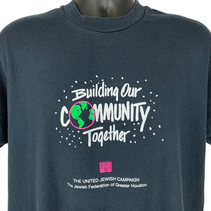 Front view of Screen Stars T-Shirt in black featuring 'Building Our Community Together' and Jewish Campaign logo