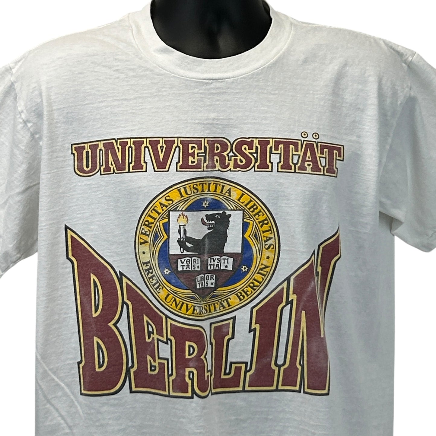Vintage white T-shirt featuring Universitat Berlin logo in burgundy and gold on the front
