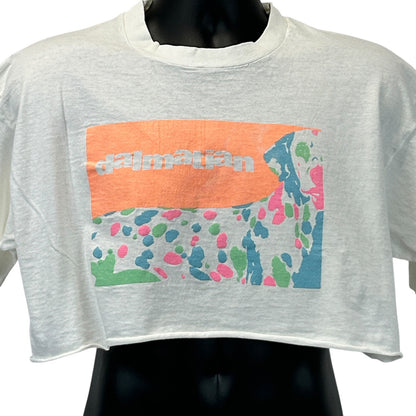 White cropped T-shirt featuring a colorful Dalmatian graphic on the front, perfect for casual wear.