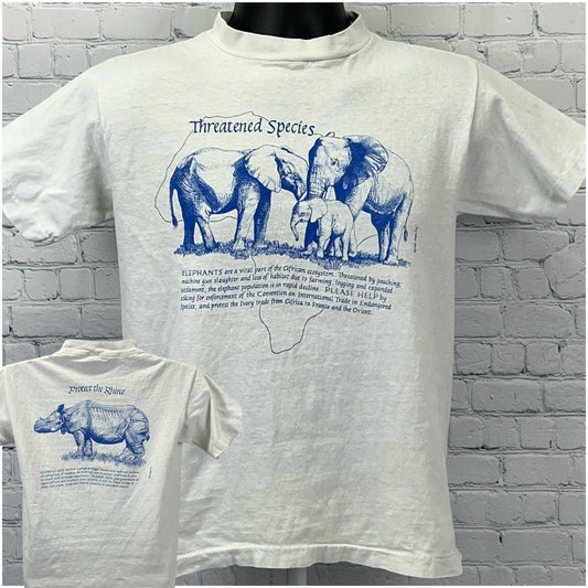 Vintage white t-shirt featuring Elephant Rhinoceros design in blue with wildlife message on front