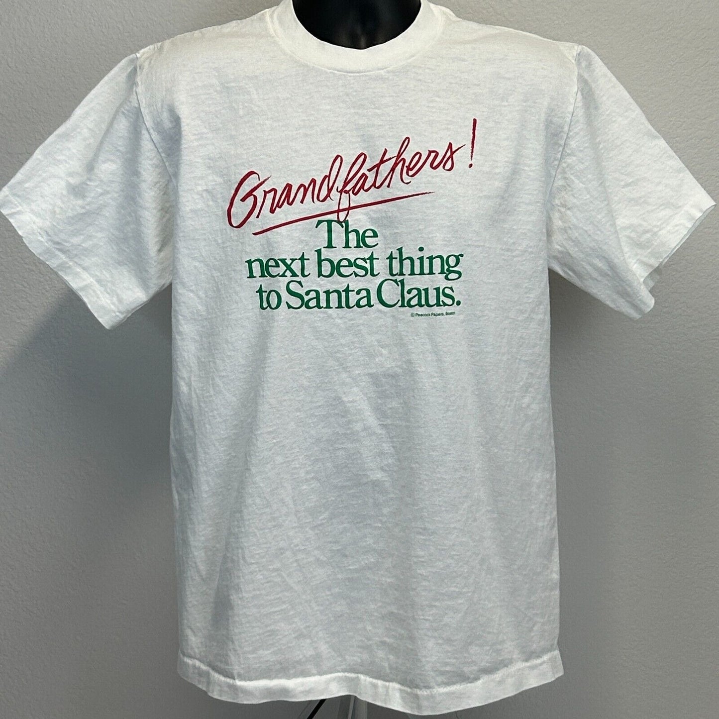 Vintage white T-shirt featuring 'Grandfather! The next best thing to Santa Claus' graphic, size medium, front view.