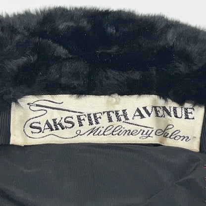 Saks Fifth Avenue black pillbox hat with fur trim, vintage style, viewed from the side