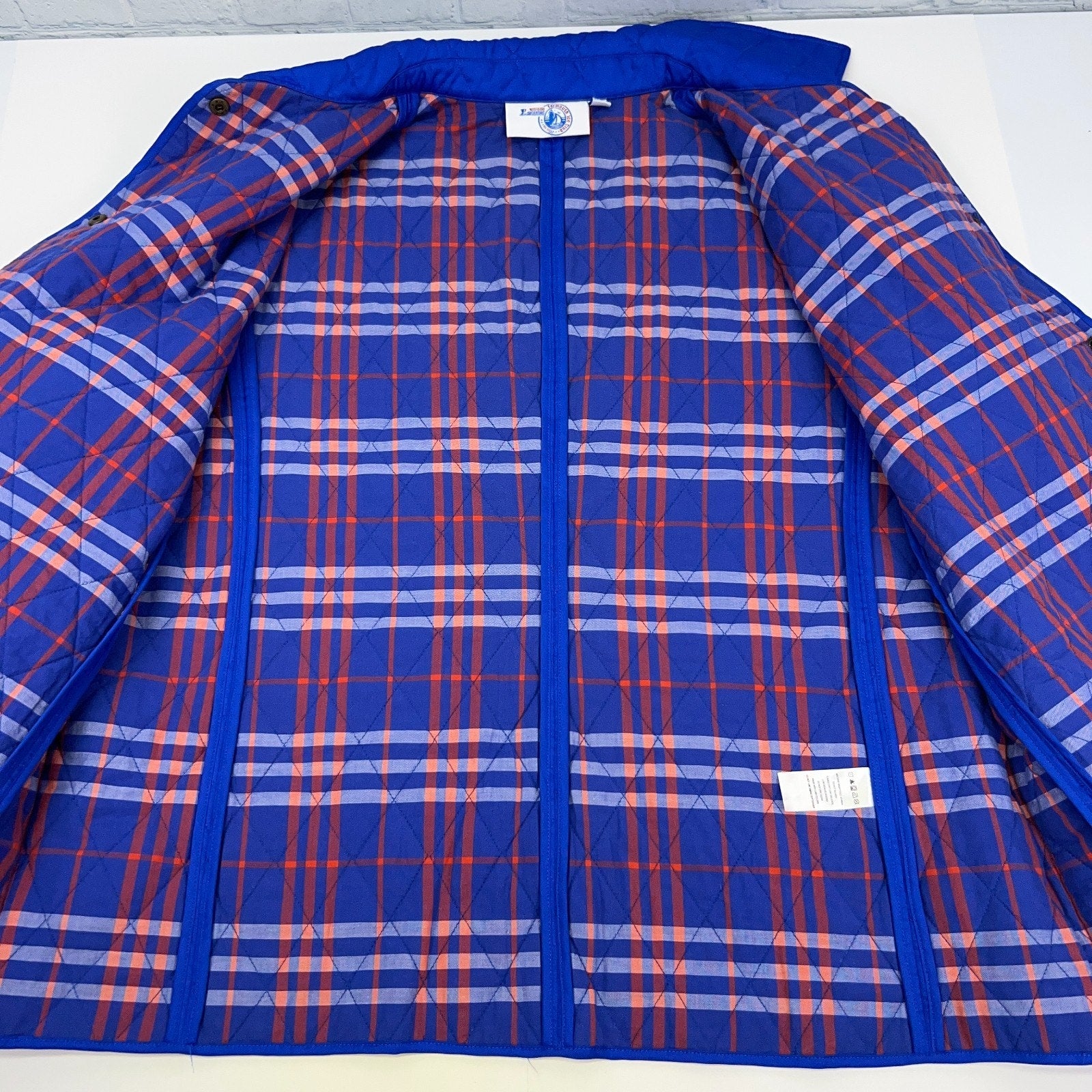 Yarmouth Ice Club quilted jacket blue front view