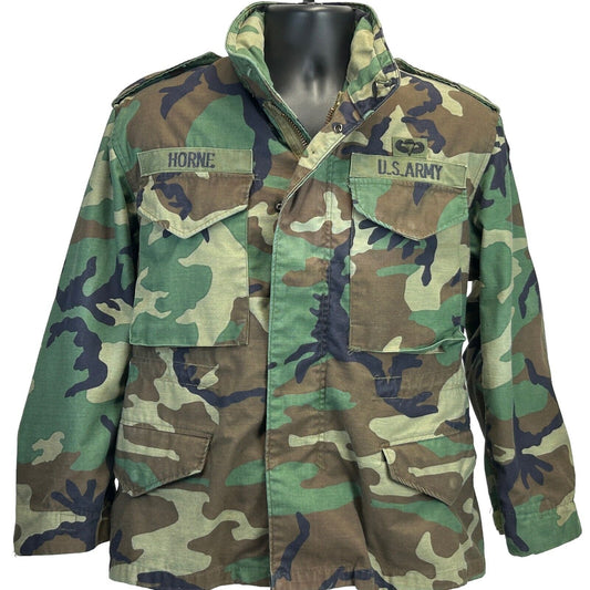 US Army Paratrooper camo jacket in green and brown with front pockets and embroidered name patch