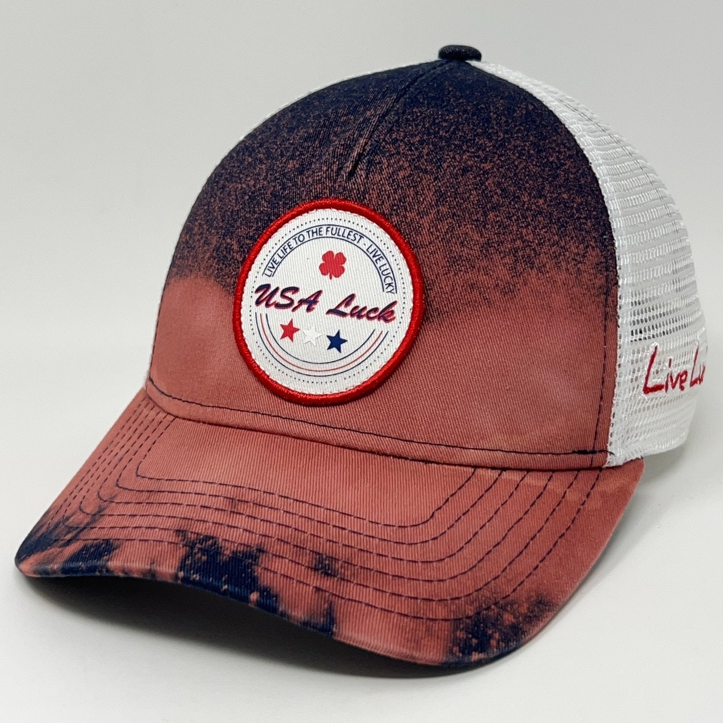 Black Clover trucker cap hat in red and navy with USA Luck patch and mesh back for casual wear