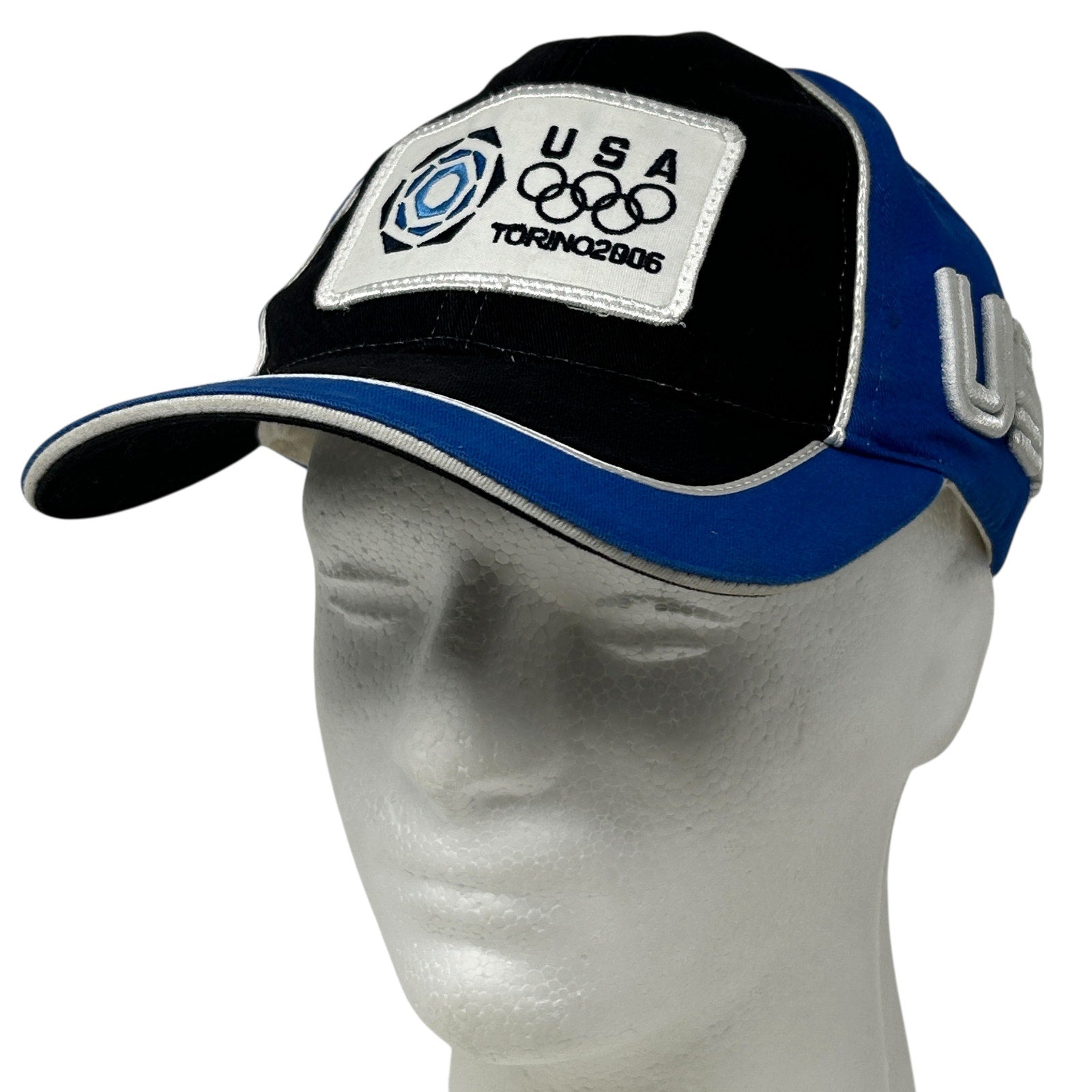 Roots USA Olympics Baseball Cap in Black and Blue with Torino 2006 Logo on Front