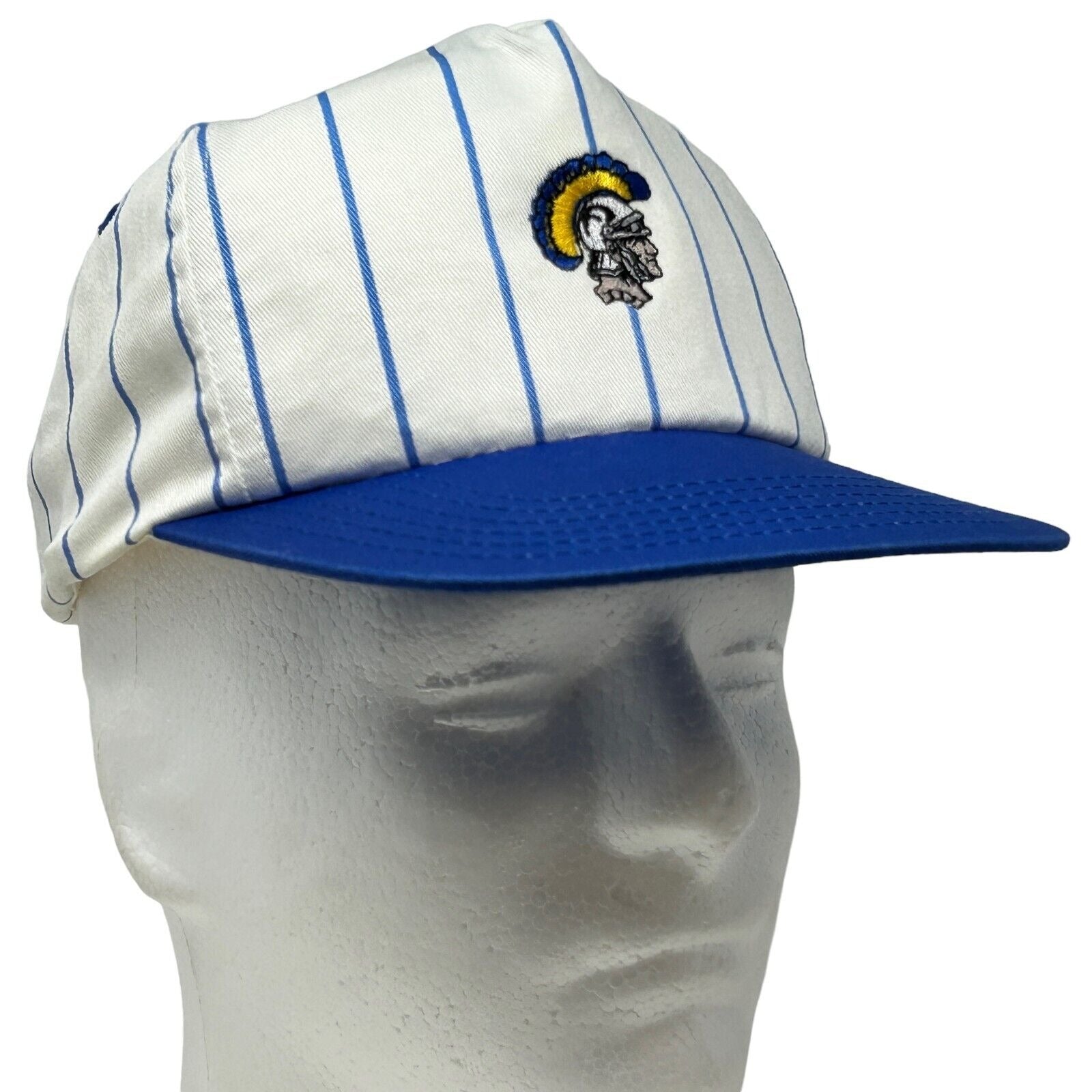 Vintage USC Trojans baseball cap in white with blue stripes, featuring embroidered logo on front