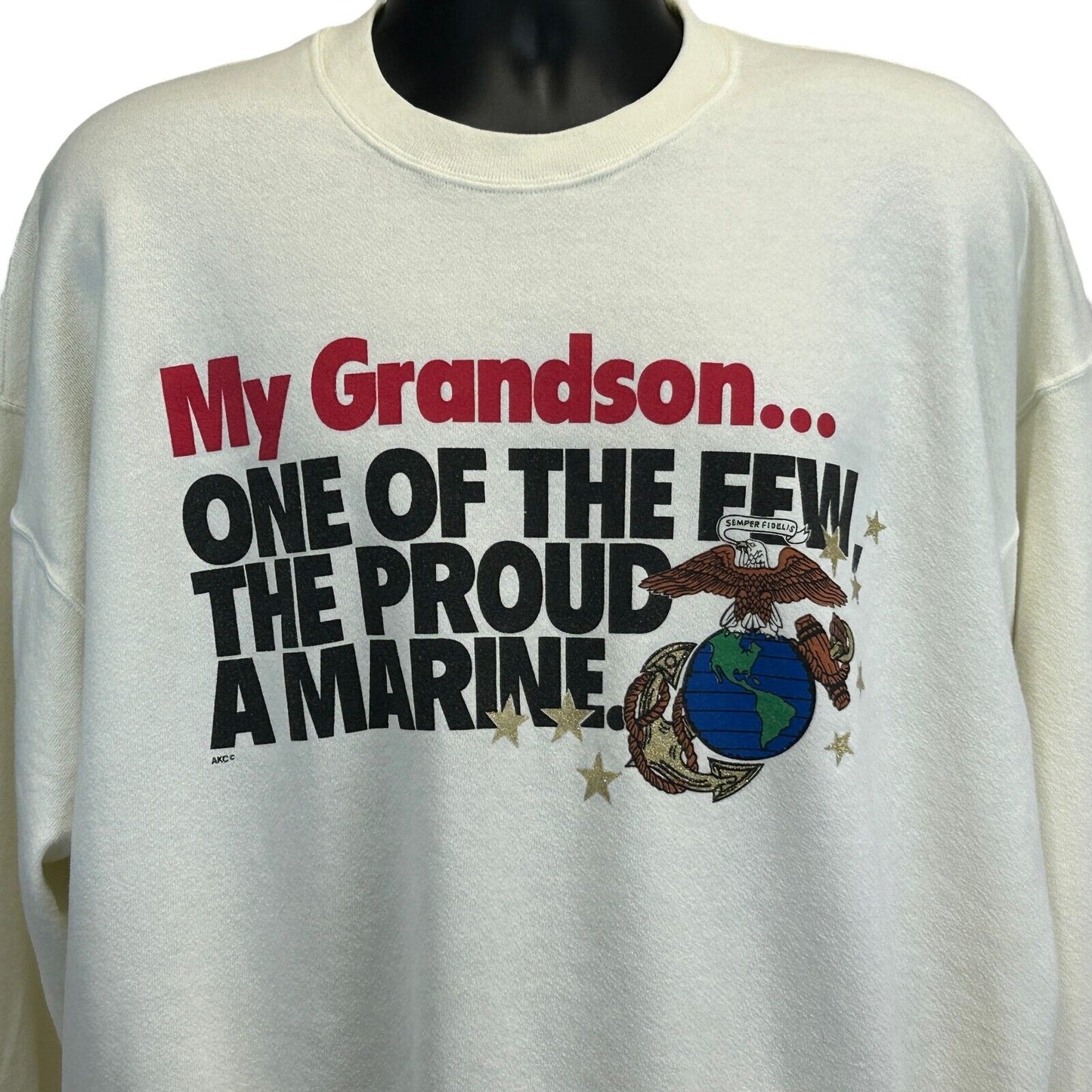 White Soffe sweatshirt featuring USMC logo with text saying My Grandson... One of the Few, The Proud, A Marine