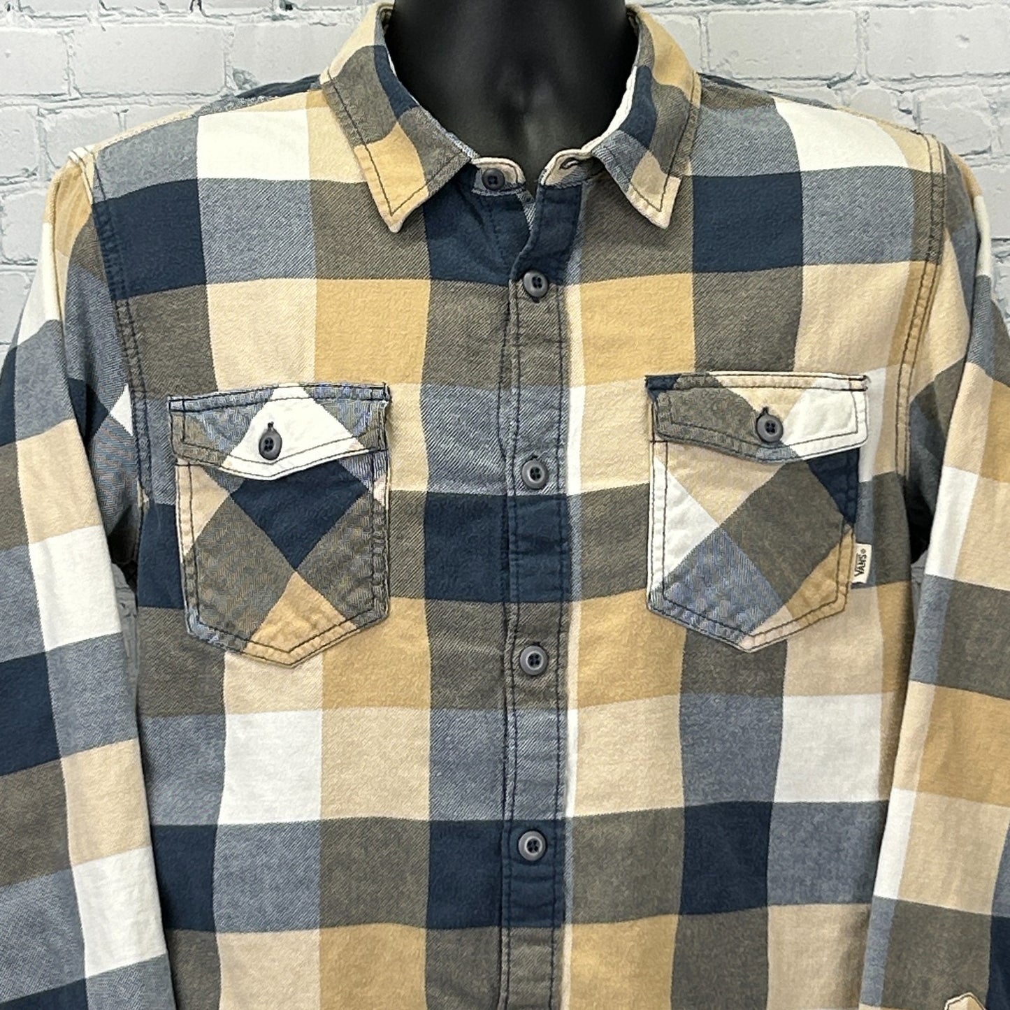 Vans Shirt in plaid pattern with yellow, navy, and white colors, featuring front chest pockets